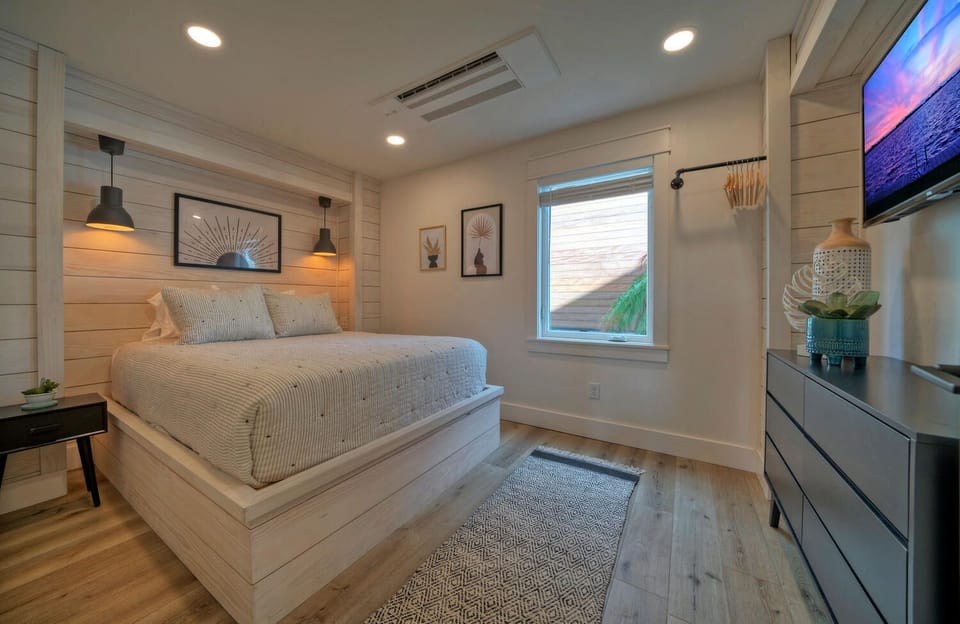 Bedroom 4 features a queen bed.