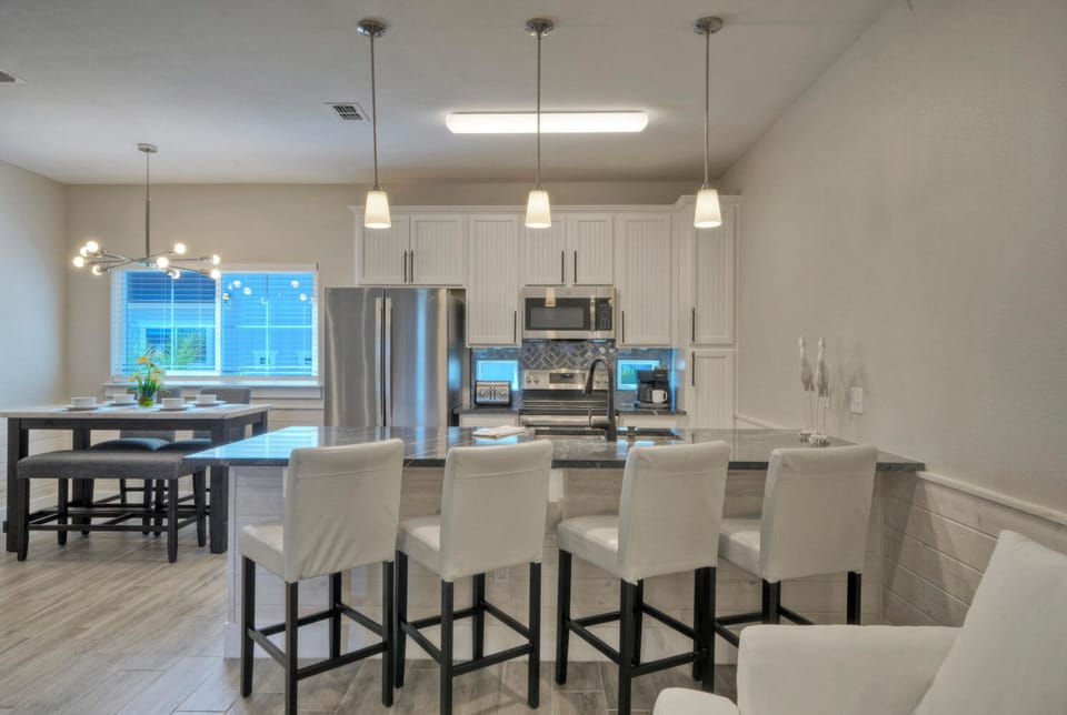 Countertop with stylish barstool seating.