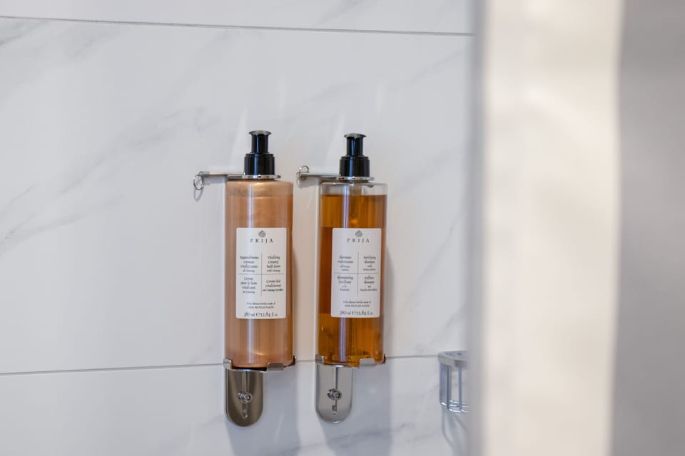 Shower, rainfall showerhead, eco-friendly toiletries, hair dryer