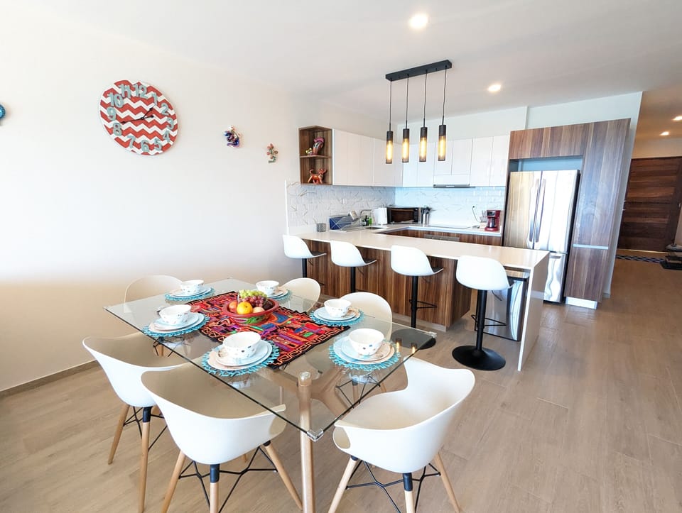 The kitchen is well equipped with a coffee maker, coffee grinder, toaster, rice maker, slow cooker, air fryer, waffle maker, blender, etc.