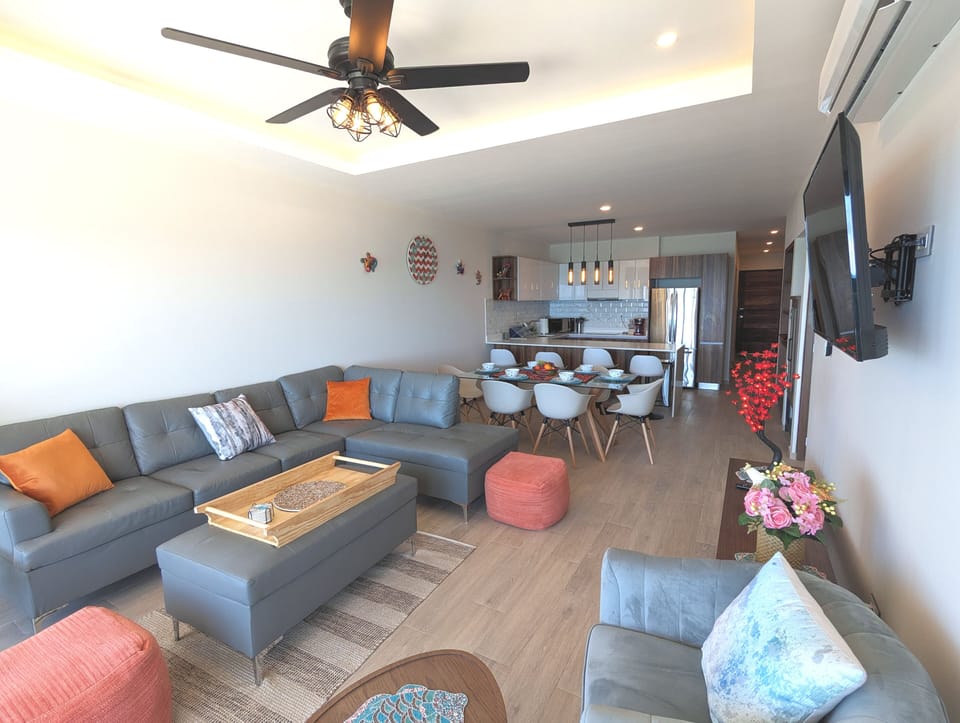 The living room and kitchen have plenty of seating even for large groups.