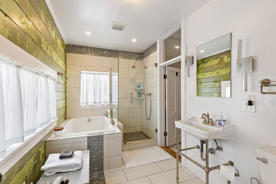 Bathroom with soaking tub and walk-in shower
