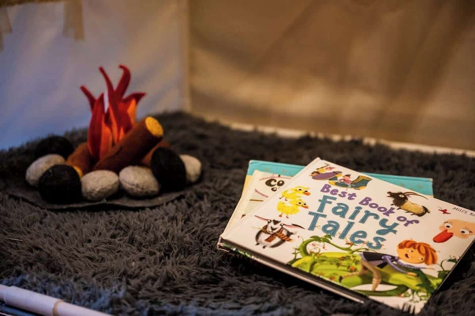A felt campfire sets the stage for bedtime tales.