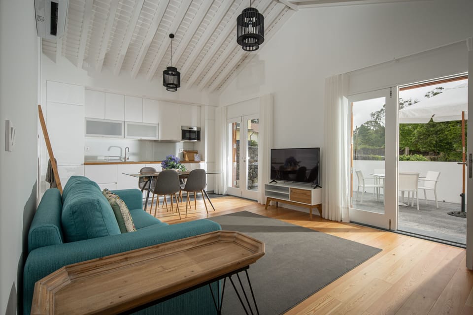 Comfort Villa | Living area | 55-inch Smart TV with cable channels