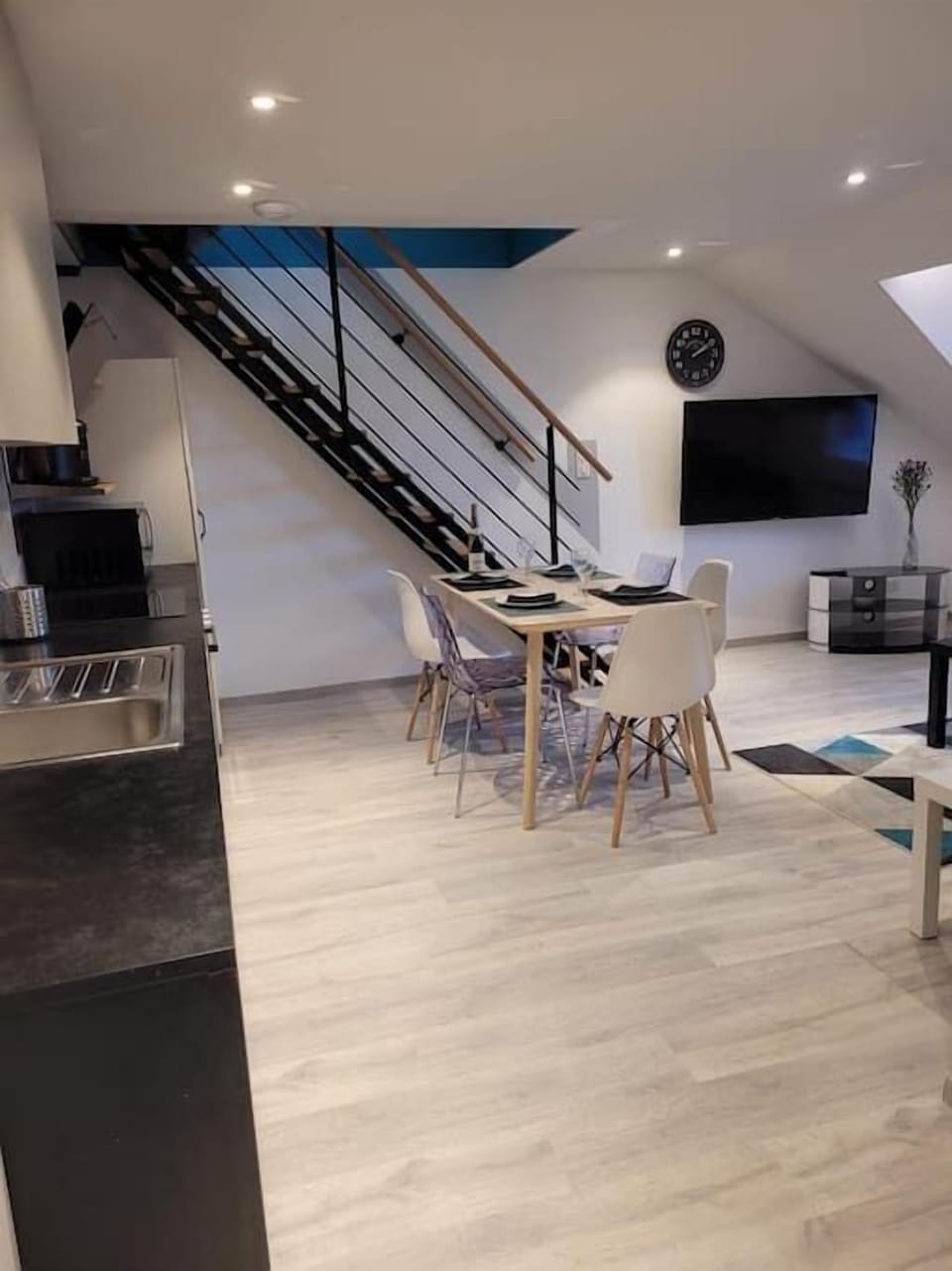 Dining area + stairs to the mezzanine