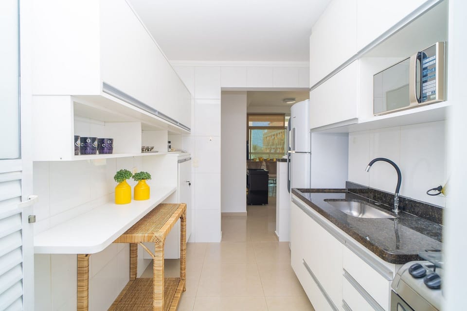 Basic Apartment | Private kitchen | Microwave, stovetop, cookware/dishes/utensils, kitchen islands