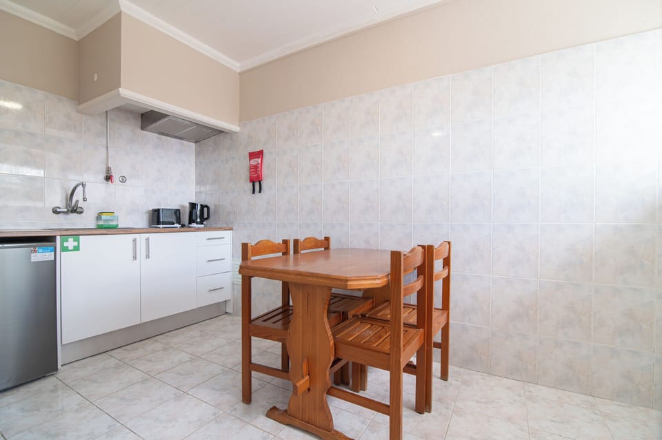 Economy Double Room | Private kitchen | Fridge, microwave, electric kettle, toaster
