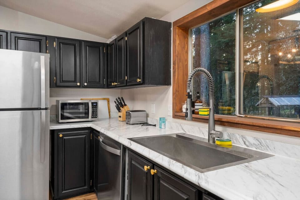 Prepare your favorite meals in the spacious kitchen, complete with a beautiful view.
