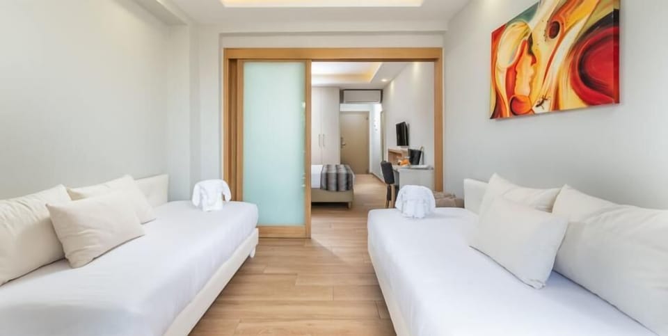Junior Suite, Terrace, Garden View (2 Adults and 2 Children) | Hypo-allergenic bedding, Select Comfort beds, in-room safe