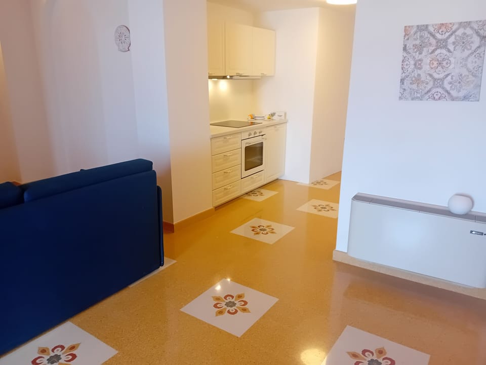 Comfort Apartment | Private kitchen | Full-size fridge, stovetop, cookware/dishes/utensils