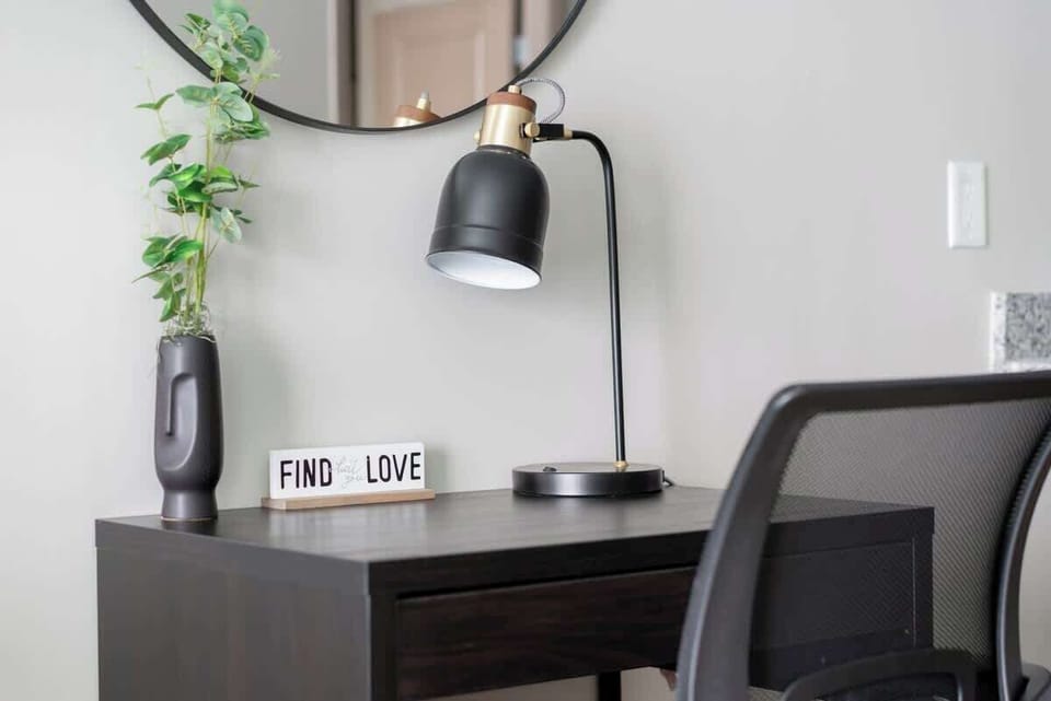                             "Find what you Love"
Desk features adjustable reclining computer chair and desk light with USB charger ports.