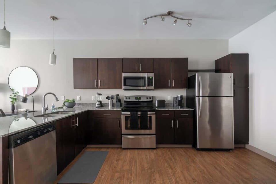 Kitchen Features:
- Dishwasher
- Stainless steel stove
- Stainless steel oven
- Stainless steel refrigerator 
- Keurig Coffee maker
- Toaster
- Blender
- Pots and pans
- Dinning ware