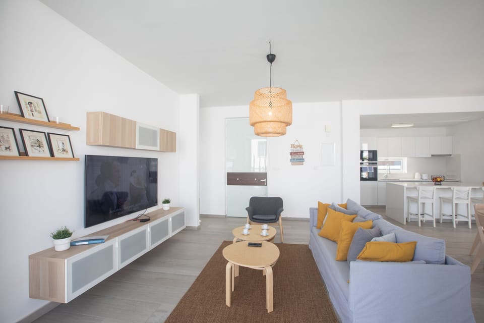 Living room with comfortable seating area and Smart TV