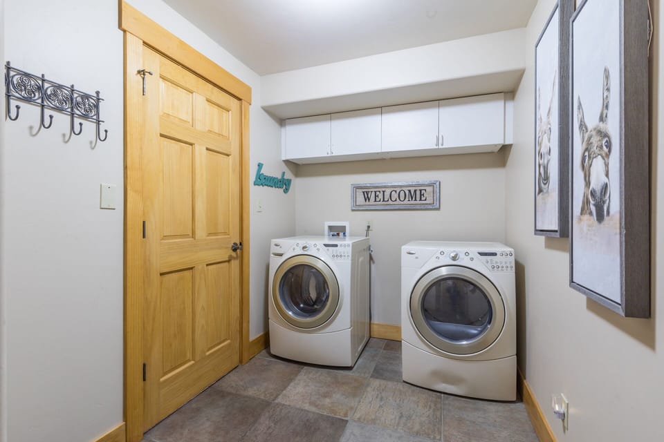 Laundry room off of garage entry.