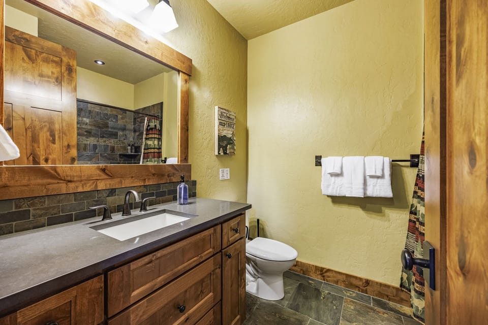 Full Size Bathroom adjacent to bedroom 3 bunk room