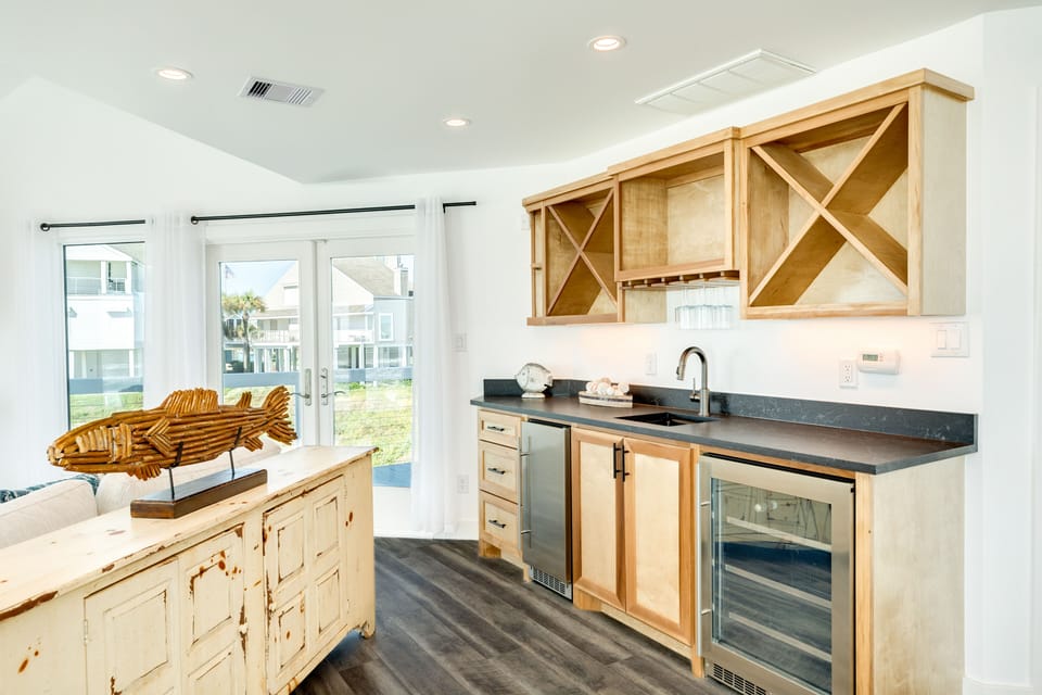 Grab your favorite drink from the adjacent wet bar