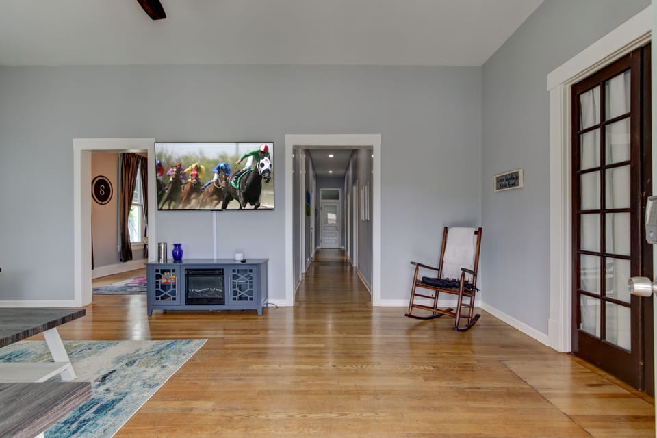 Large Living area with 65 in smart TV.