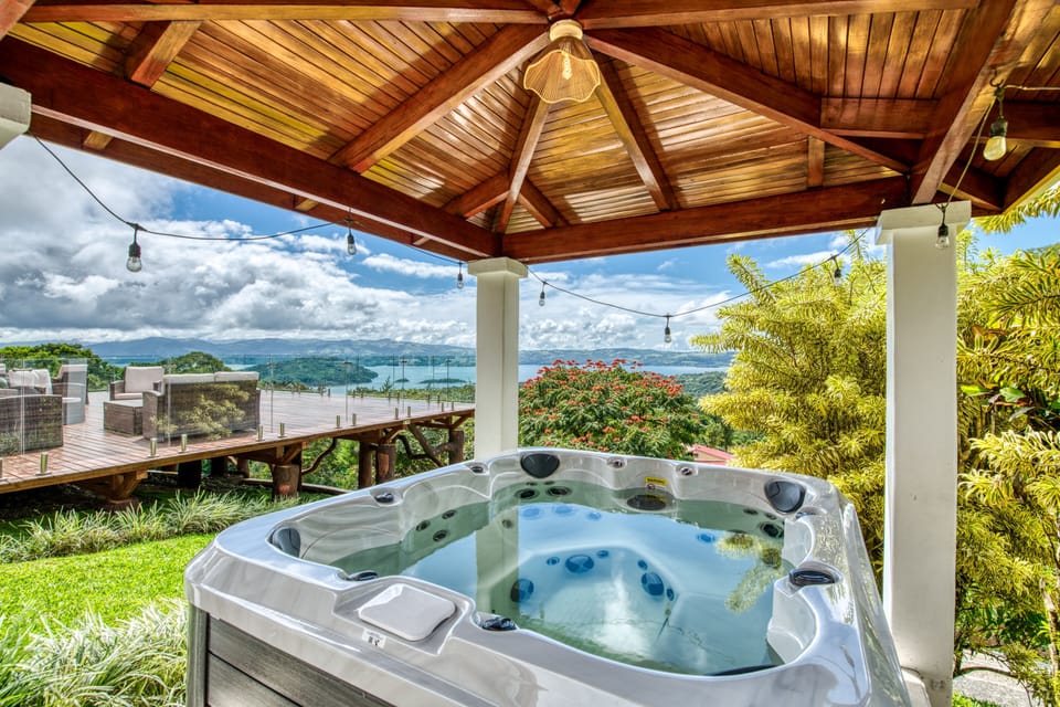 Covered 6 person hot tub overlooking the lake right outside of Casa Grande.