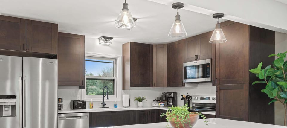 Open concept living, dining and kitchen area.