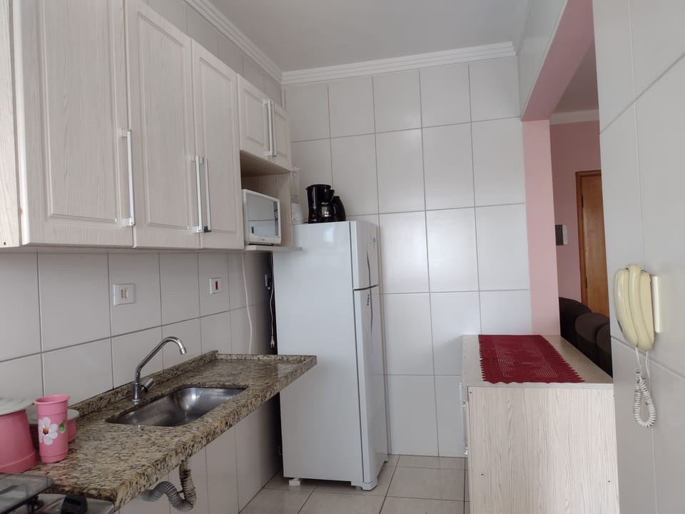 Apartment | Private kitchen | Blender, cookware/dishes/utensils, cleaning supplies, dining tables