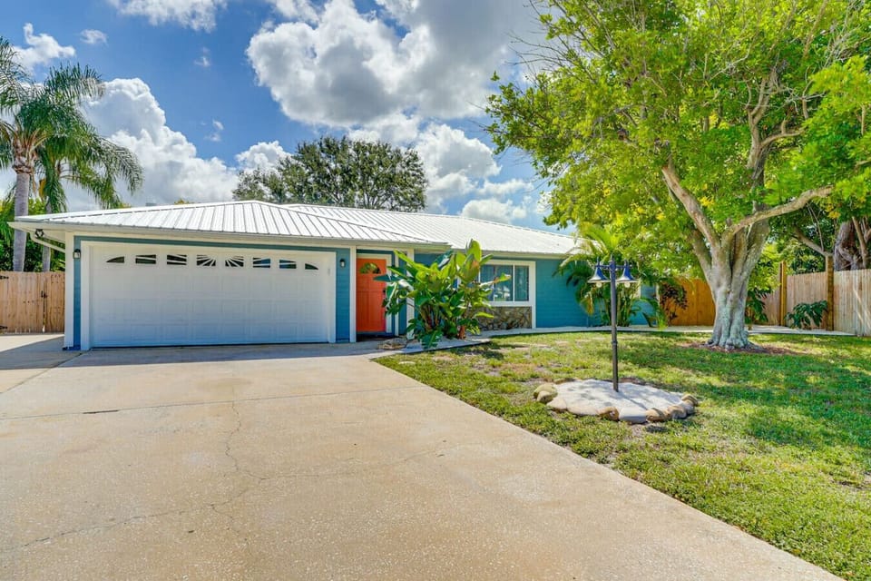 Front view from rental with garage and oversized driveway