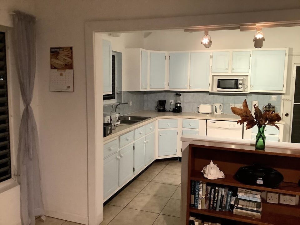 View of kitchen from dining room