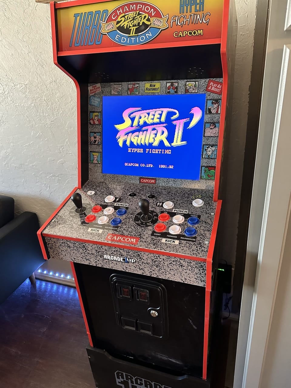 Ultimate Family Fun Zone! 🎮🛋️ – Our living room is all about relaxation, with plush couches, a TV for bonding, and an arcade for hours of gaming excitement!