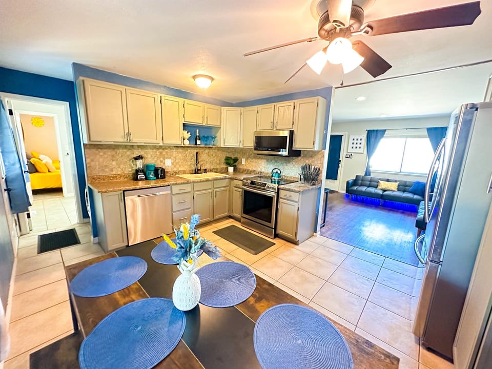 Cook Up a Storm! 🍴🔥 – Discover your inner chef in our well-stocked kitchen, featuring utensils and kitchenware. Enjoy meals with family or friends at the spacious 6-seater dining table.