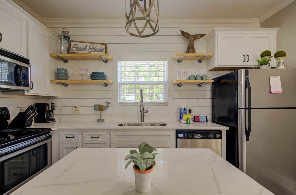 Splendid kitchen with stainless steel appliances.