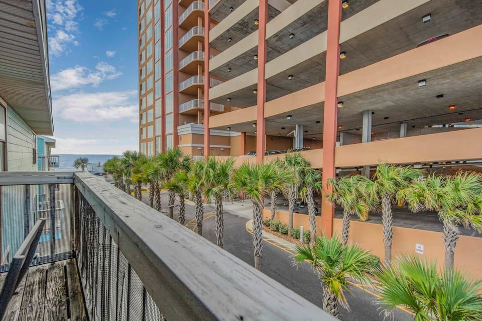 See the beach from the balcony.