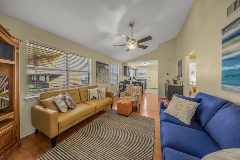 Living space includes a sleeper sofa and futon.