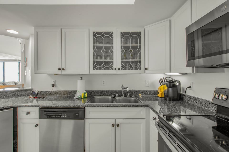 Well equipped kitchen stocked with pots/pans/utensils