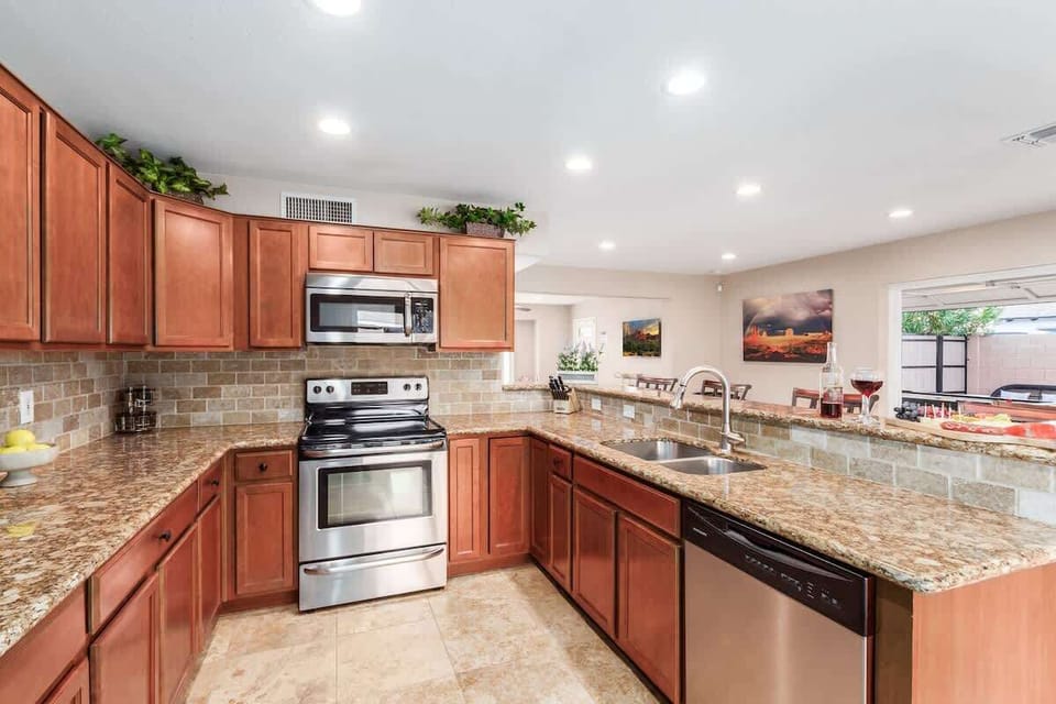 Fully equipped kitchen with stainless steel appliances, and all your basic cooking essentials.