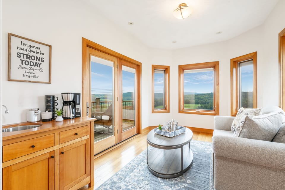 Private intimate seating area in the master suite with a private deck