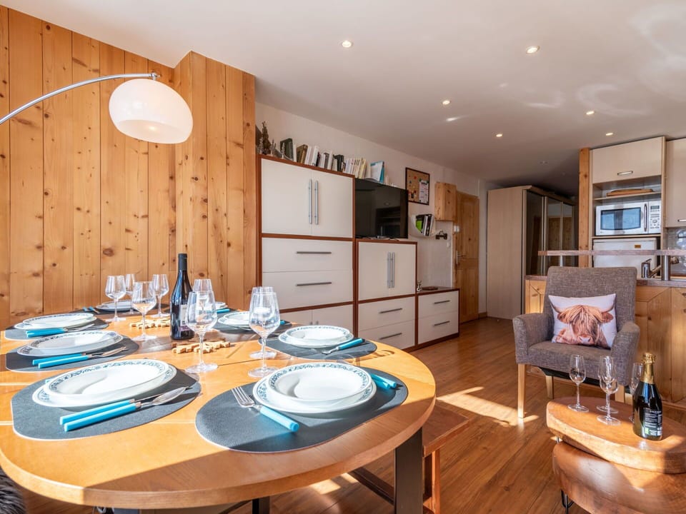 Table, Furniture, Property, Cabinetry, Chair, Building, Wood, Interior Design, Lighting, Dishware