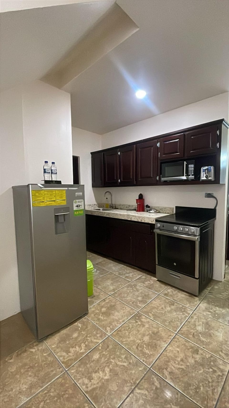 Classic Suite | Private kitchen | Mini-fridge, microwave, coffee/tea maker, cookware/dishes/utensils