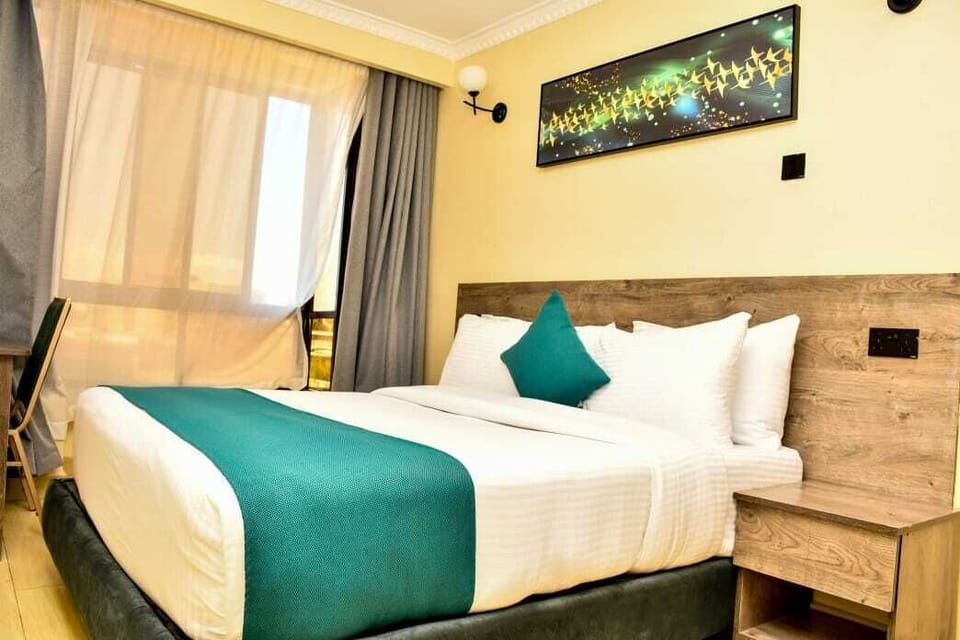 Deluxe Room | Laptop workspace, blackout drapes, soundproofing, free WiFi