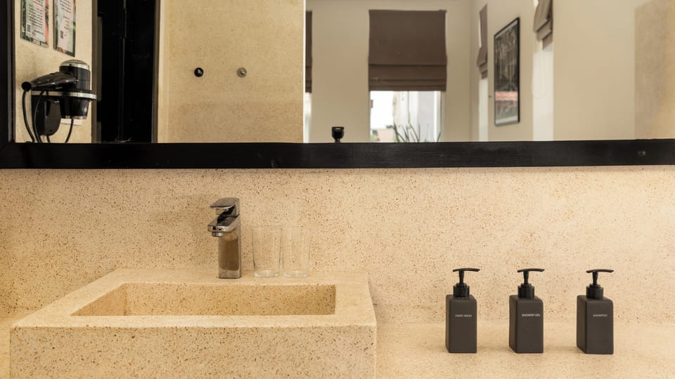 Separate tub and shower, hair dryer, towels, soap