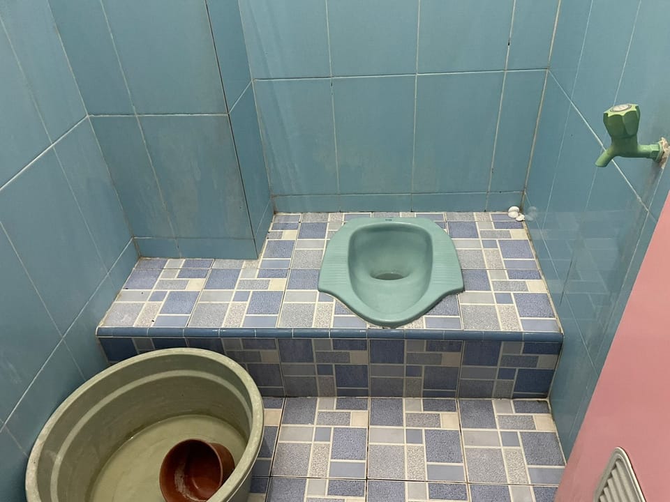 Double Room | Bathroom | Shower, towels, toilet paper