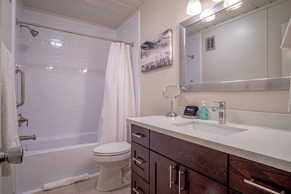 Shared bathroom across from bedrooms - guest essentials provided