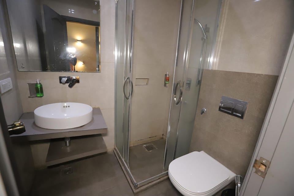 Shower, designer toiletries, slippers, bidet