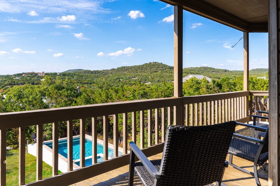 Sip your morning coffee and gaze at the picturesque hill country landscape from the balcony, with a refreshing inground pool just steps away.