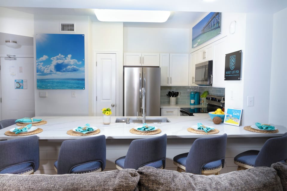 modern kitchen with a large island and seating for six