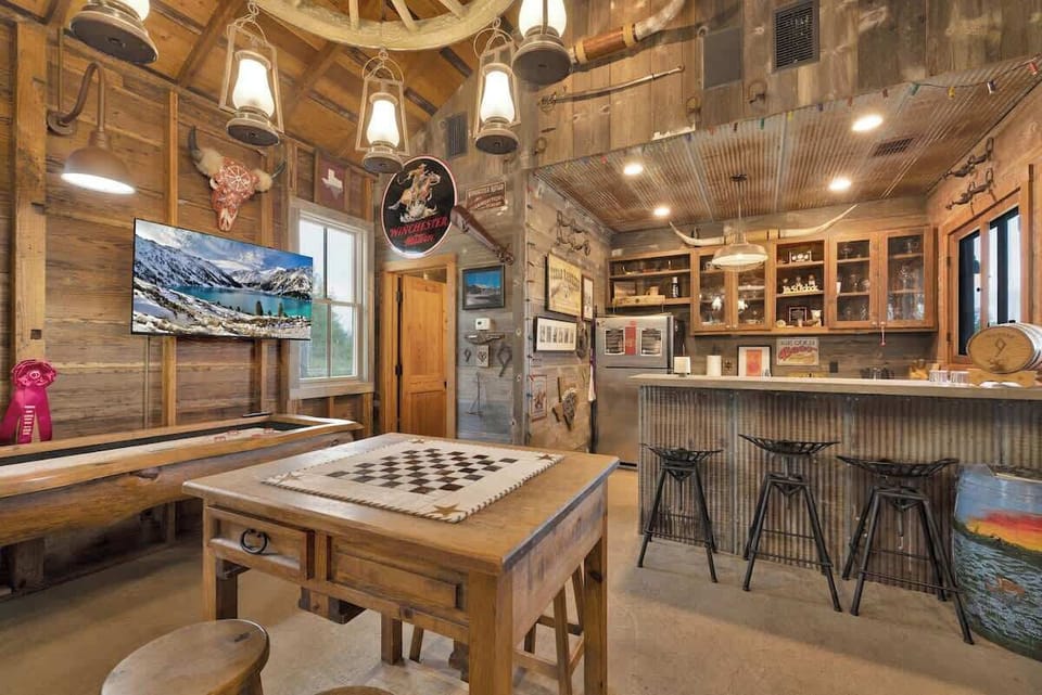 Games and kitchenette in The Saloon.