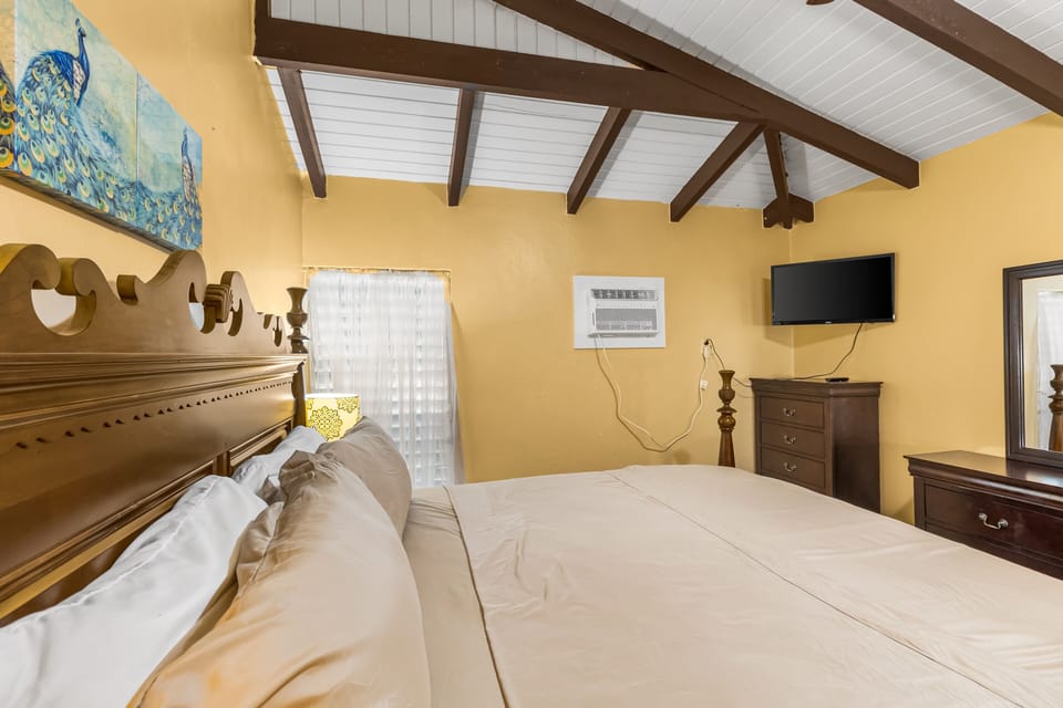 Condo, 1 Bedroom | 1 bedroom, desk, laptop workspace, iron/ironing board