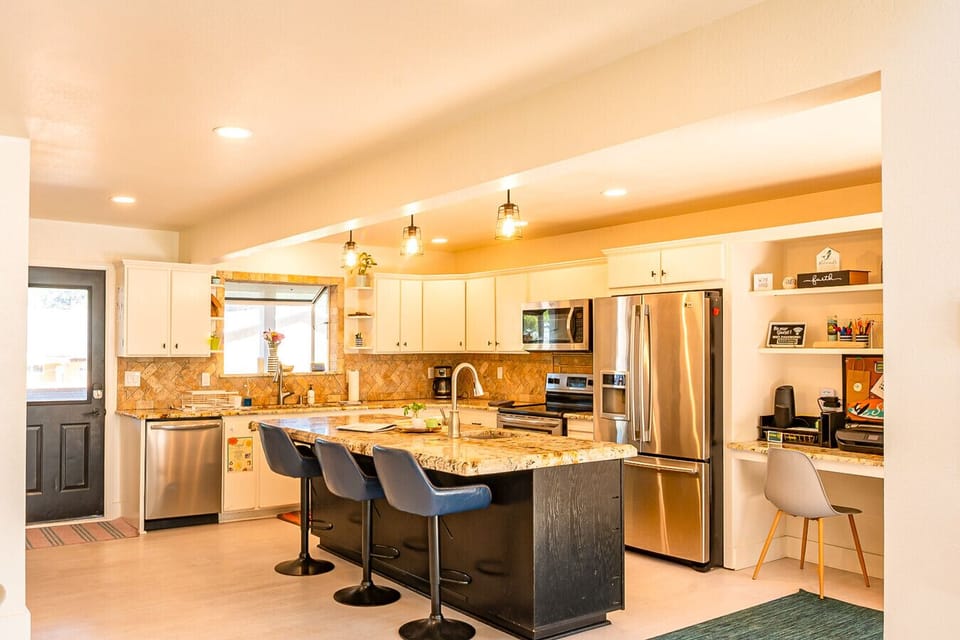 Prepare fresh meals with ease in this fully equipped, modern kitchen, a central amenity that elevates your stay at our Brookings, Oregon vacation rental.