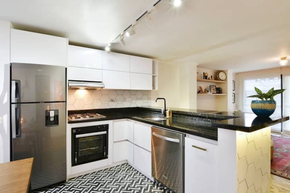 Renovated kitchen complete with dishwasher.