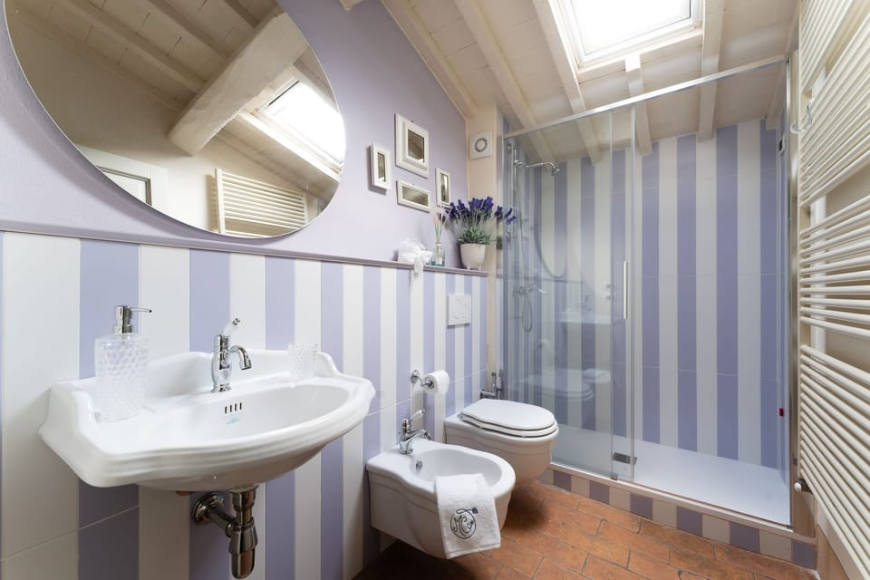 Deluxe Triple Room | Bathroom | Shower, designer toiletries, hair dryer, bathrobes