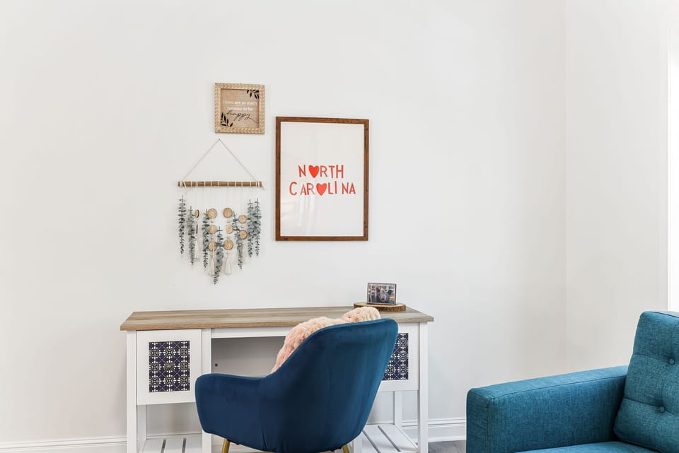 Plenty of space to get work done at the desk in the dining room. 