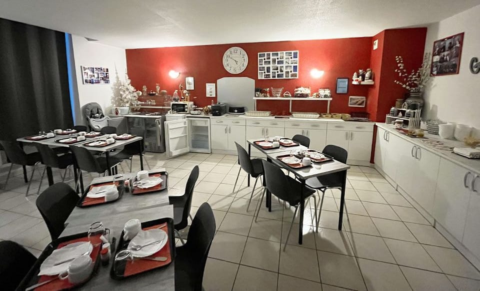 Gather for delicious meals in a warm, inviting dining area, crafted for enjoyment.